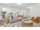 Spacious living room with an open floor plan and views of the kitchen at 105 Mable Court # 10, Lillington, NC 27546