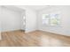 Bright and airy living room features hardwood floors and natural light from large windows at 110 Hickory Grove Dr, Sanford, NC 27330