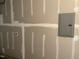 Garage wall with a circuit breaker box at 1116 Merlot Hills Ln, Durham, NC 27704