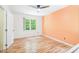 Bright bedroom with hardwood floors and natural light at 114 Bonaparte Dr, Hillsborough, NC 27278