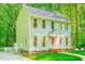 Well-maintained two-story home with a side entrance and a charming white picket fence at 114 Bonaparte Dr, Hillsborough, NC 27278