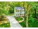 Charming two-story home with a lovely yard, inviting entrance, and beautifully manicured lawn at 114 Bonaparte Dr, Hillsborough, NC 27278
