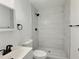 A beautifully renovated bathroom with a tiled walk-in shower and modern fixtures at 114 N Guthrie Ave, Durham, NC 27703