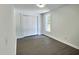 Bedroom featuring hardwood floors, large closet and natural light at 114 N Guthrie Ave, Durham, NC 27703