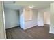 Bedroom featuring neutral walls, new flooring, natural light and a closet at 114 N Guthrie Ave, Durham, NC 27703