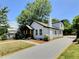 Side view of the house with the driveway at 114 N Guthrie Ave, Durham, NC 27703