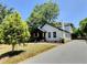 Side view of the house with the driveway at 114 N Guthrie Ave, Durham, NC 27703