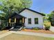 Charming renovated home with a covered porch and yellow posts at 114 N Guthrie Ave, Durham, NC 27703