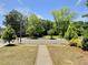 View of the home's front yard from the covered porch at 114 N Guthrie Ave, Durham, NC 27703