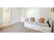 Bright bedroom featuring a twin daybed with ample storage space, carpet, and natural light at 1208 Manassas Ct # A, Raleigh, NC 27609