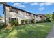 Multi-Gathering exterior with tidy lawn, inviting residents and visitors with maintained landscaping at 1208 Manassas Ct # A, Raleigh, NC 27609