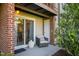 Patio with an outdoor chair and privacy offering a relaxing and peaceful atmosphere at 1208 Manassas Ct # A, Raleigh, NC 27609