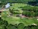 Expansive view of the golf course, highlighting the immaculate greens, bunkers, and verdant surroundings at 1217 Briar Patch Ln, Raleigh, NC 27615
