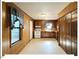 Traditional kitchen with wood paneling, tile floors, and an electric range at 125 Forsyth Dr, Chapel Hill, NC 27517