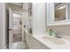 Bright bathroom featuring white cabinetry and a sleek vanity at 12500 Richmond Run Dr, Raleigh, NC 27614