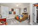 Comfortable bedroom with sports-themed decor, cozy bed and plenty of sunlight at 12500 Richmond Run Dr, Raleigh, NC 27614