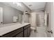 Stylish bathroom featuring a combination shower and tub, modern fixtures and neutral decor at 128 Potomac River St, Garner, NC 27529