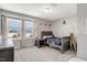 Cozy bedroom with a large window and basketball hoop, perfect for  at 128 Potomac River St, Garner, NC 27529
