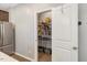 View of pantry with wire shelves and stocked with food items at 128 Potomac River St, Garner, NC 27529