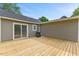 Backyard featuring an outdoor deck at 128 W Parker St, Henderson, NC 27536
