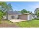 Wide shot of the backyard featuring an outdoor deck at 128 W Parker St, Henderson, NC 27536