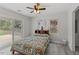 Bright bedroom with a sliding glass door to the outdoor deck at 128 W Parker St, Henderson, NC 27536