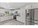 Well-equipped kitchen with stainless steel appliances and ample cabinet space at 128 W Parker St, Henderson, NC 27536