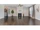 Spacious living room featuring a fireplace and hardwood floors at 1304 Revolution Cir, Raleigh, NC 27603