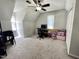 Bedroom featuring carpet, a ceiling fan, and lots of storage space at 1305 Shakentown St, Knightdale, NC 27545