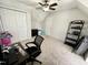 Bedroom featuring carpet, a ceiling fan, and lots of storage space at 1305 Shakentown St, Knightdale, NC 27545