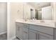 Bathroom featuring a double sink vanity, and a glass doored shower at 136 Ashlar Ct, Cary, NC 27519