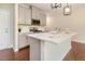 Contemporary kitchen with a kitchen island, pendant lighting, and stainless steel appliances at 136 Ashlar Ct, Cary, NC 27519