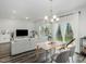 Bright and spacious living room featuring modern furniture and natural light at 136 Ashlar Ct, Cary, NC 27519