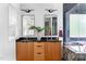Elegant bathroom with double vanity, modern light fixtures, and stylish decor at 1405 Watts St, Durham, NC 27701