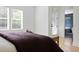 Bright bedroom featuring multiple windows and a neutral color palette at 1405 Watts St, Durham, NC 27701