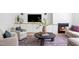 Inviting living room featuring a modern fireplace, built-in shelving, and stylish furnishings at 1405 Watts St, Durham, NC 27701