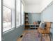 Mudroom area features built-in bench, shelves, baskets, and decorative pillows at 1405 Watts St, Durham, NC 27701