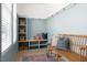 Light and airy mudroom with custom shelving, bench seating, and decorative accents at 1405 Watts St, Durham, NC 27701