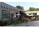 Exterior view of a charming restaurant with outdoor seating and greenery at 1405 Watts St, Durham, NC 27701