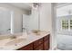 Bathroom featuring a double sink vanity and neutral countertop at 1420 Lagerfeld Way, Wake Forest, NC 27587