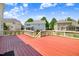 Wooden deck with painted wood railings offers scenic views of the backyard at 1420 Lagerfeld Way, Wake Forest, NC 27587
