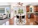 Cozy dining space with backyard views, adjacent to living room and kitchen at 1420 Lagerfeld Way, Wake Forest, NC 27587