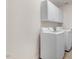Laundry room with white washer, dryer and storage cabinets at 1420 Lagerfeld Way, Wake Forest, NC 27587