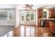Open floor plan with hardwood floors and stainless steel kitchen appliances at 1420 Lagerfeld Way, Wake Forest, NC 27587