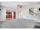 Bright living room flows into a kitchen with hardwood floors and cabinets at 1420 Lagerfeld Way, Wake Forest, NC 27587