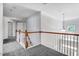 Upstairs hallway with neutral walls and new carpeting at 1420 Lagerfeld Way, Wake Forest, NC 27587