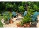 Landscaped backyard with seating, fire pit, and lush greenery, perfect for entertaining at 1503 Hollywood St, Durham, NC 27701