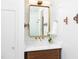 Modern bathroom features a wood vanity with white quartz counters, and unique fixtures at 1503 Hollywood St, Durham, NC 27701