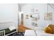 Cozy Bedroom featuring hardwood floors, a comfortable armchair and ottoman, and charming decor at 1503 Hollywood St, Durham, NC 27701