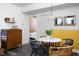 Comfortable dining area off kitchen includes a white marble table with seating for four at 1503 Hollywood St, Durham, NC 27701